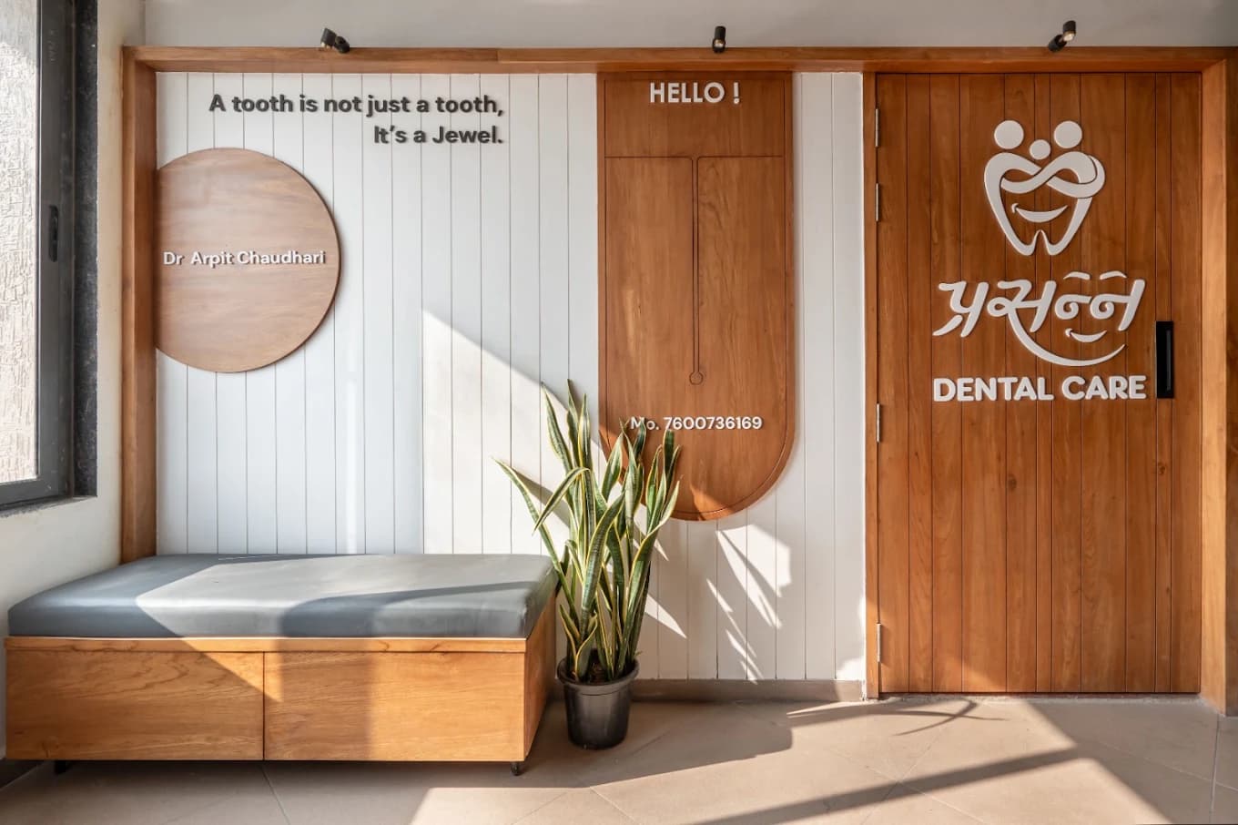 Prasanna Dental Care clinic entrance with warm wooden panelling